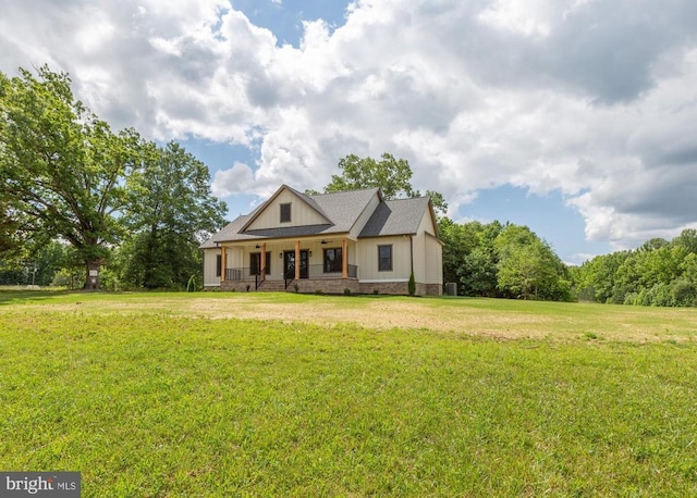 885 Buckners Ln, Compass Cove At Lake Anna Mineral, VA 23117 - view of front of property featuring a front yard and a porch