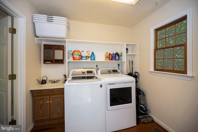 302 Gold Valley Rd, Locust Grove, VA 22508 - washroom featuring independent washer and dryer, dark wood-type flooring, cabinet space, and baseboards