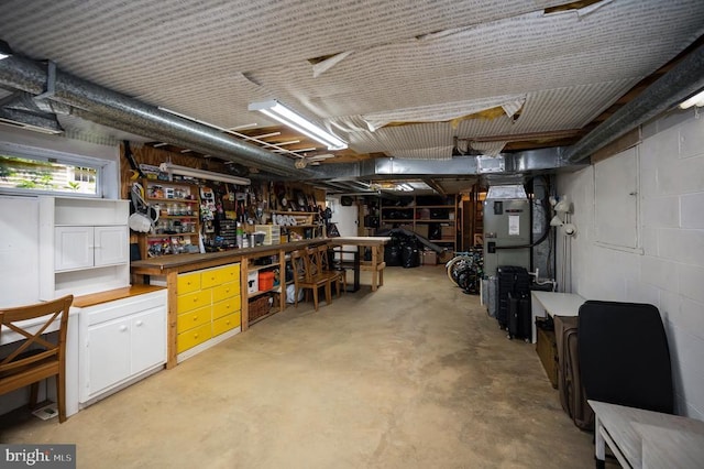 302 Gold Valley Rd, Locust Grove, VA 22508 - unfinished below grade area with a workshop area, concrete block wall, and heating unit