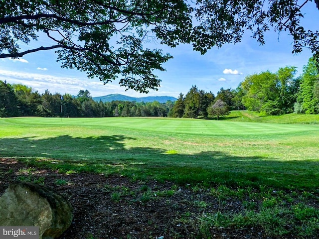 988 Towne Ln, Charlottesville, VA 22901 - view of home's community featuring view of golf course, a lawn, view of scattered trees, and a mountain view