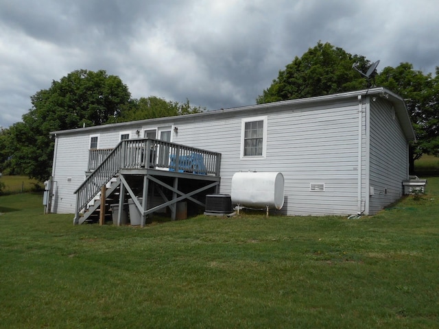 2780 Sunrise Dr, Broadway, VA 22815 - back of house with heating fuel, a wooden deck, cooling unit, stairs, and a yard