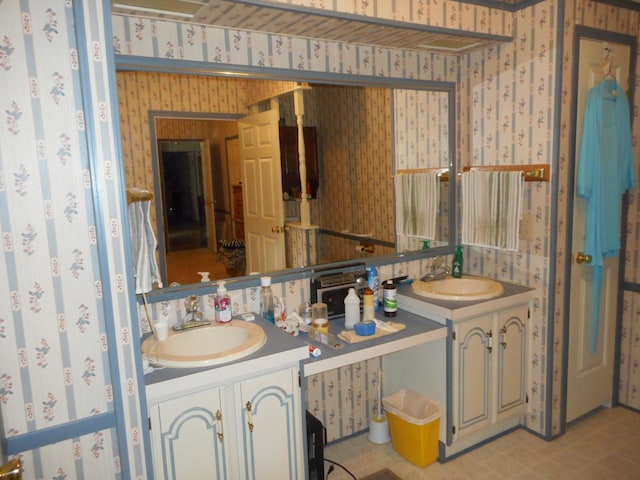 2780 Sunrise Dr, Broadway, VA 22815 - bathroom featuring wallpapered walls and double vanity