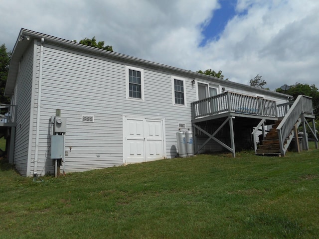 2780 Sunrise Dr, Broadway, VA 22815 - rear view of property featuring a deck, a lawn, and stairs