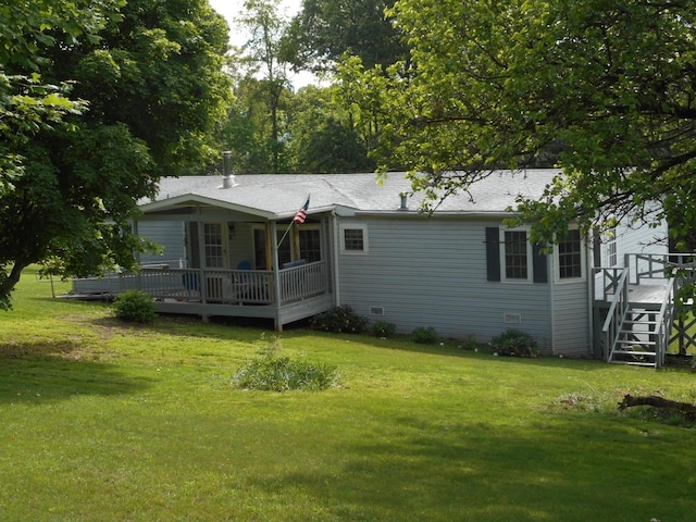 2780 Sunrise Dr, Broadway, VA 22815 - back of property with a lawn and a deck