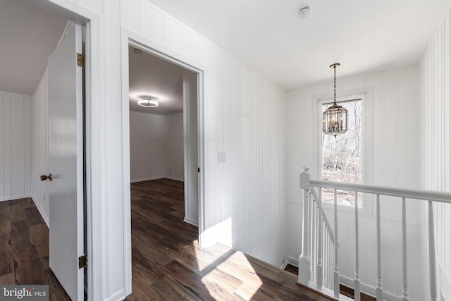 201 Chad Berry Ln, Syria, VA 22743 - hallway with an upstairs landing, a chandelier, and dark wood-type flooring