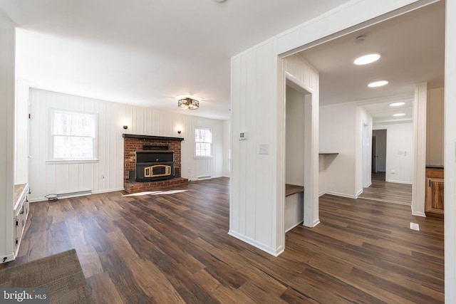 201 Chad Berry Ln, Syria, VA 22743 - unfurnished living room with dark wood-style floors, baseboards, and recessed lighting