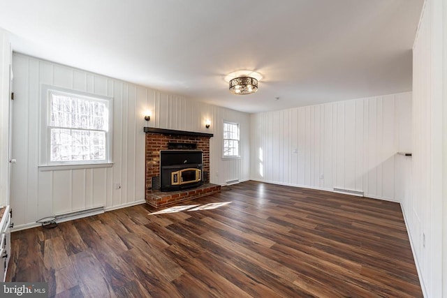 201 Chad Berry Ln, Syria, VA 22743 - unfurnished living room with dark wood-style floors, baseboard heating, and baseboards