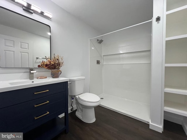 9872 Red Hill Rd, Spotsylvania, VA 22553 - full bath with vanity, wood finished floors, and tiled shower
