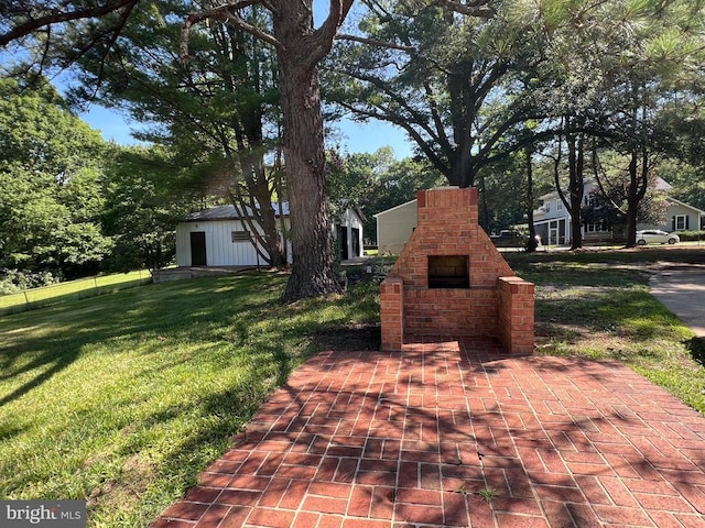 9872 Red Hill Rd, Spotsylvania, VA 22553 - view of green lawn featuring an outdoor brick fireplace
