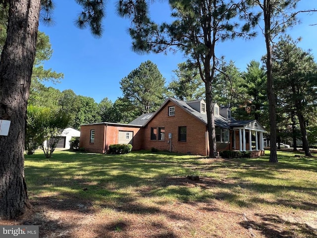 9872 Red Hill Rd, Spotsylvania, VA 22553 - view of side of property featuring brick siding and a lawn