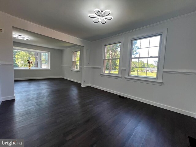 9872 Red Hill Rd, Spotsylvania, VA 22553 - unfurnished living room with dark wood-style flooring, ornamental molding, and a chandelier