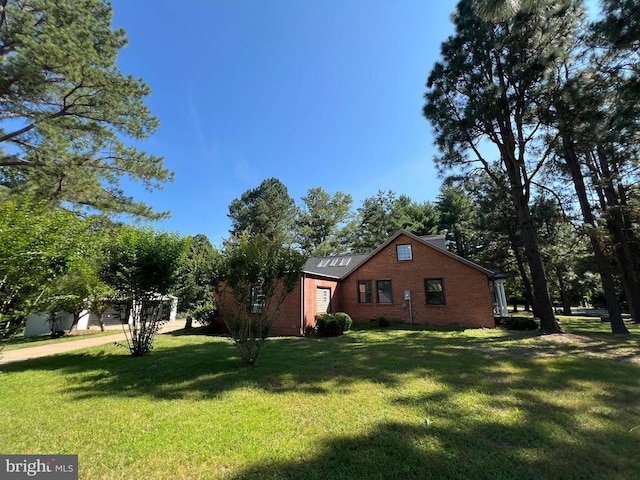 9872 Red Hill Rd, Spotsylvania, VA 22553 - view of side of property featuring brick siding and a yard