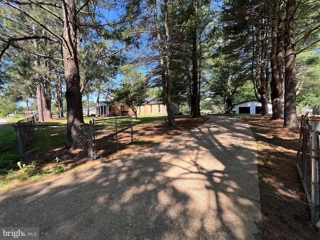 9872 Red Hill Rd, Spotsylvania, VA 22553 - view of asphalt driveway with a gate
