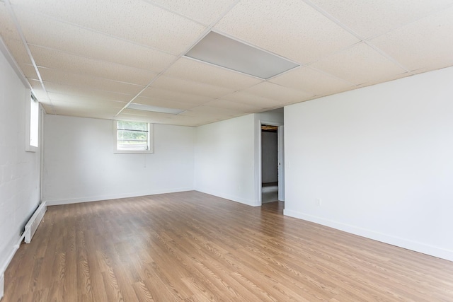 871 Kent Rd, Waynesboro, VA 22980 - unfurnished room with light wood-style flooring, a baseboard heating unit, and a drop ceiling