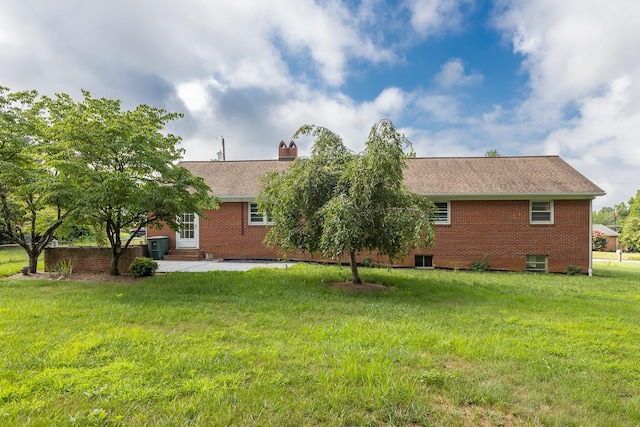871 Kent Rd, Waynesboro, VA 22980 - rear view of house with brick siding, a lawn, and a patio