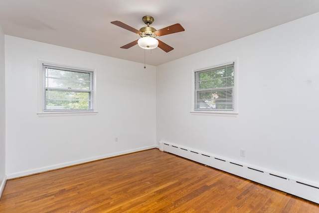 871 Kent Rd, Waynesboro, VA 22980 - empty room featuring a baseboard radiator, light wood finished floors, and ceiling fan