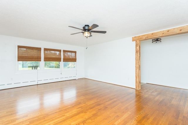 871 Kent Rd, Waynesboro, VA 22980 - unfurnished room with light wood-style floors, a ceiling fan, and baseboard heating