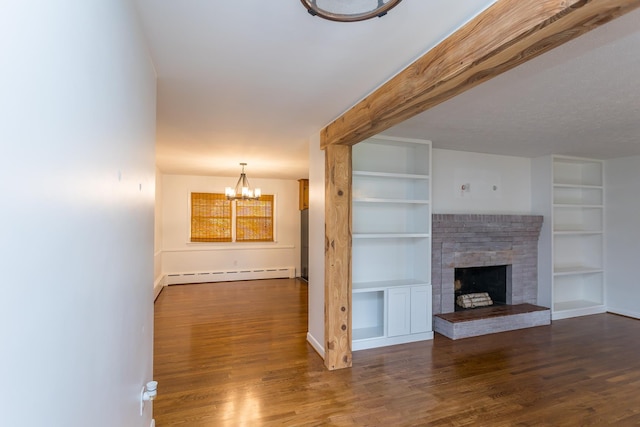 871 Kent Rd, Waynesboro, VA 22980 - unfurnished living room featuring a chandelier, built in features, dark wood finished floors, and a fireplace