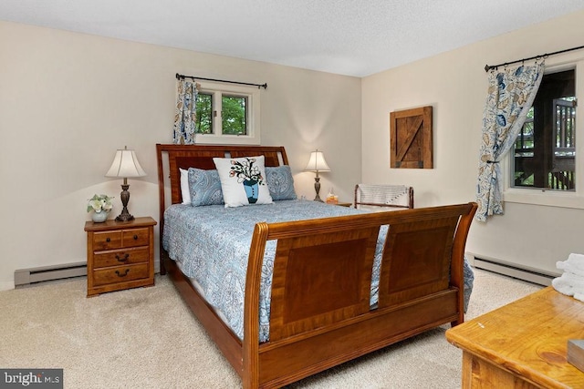 589 Pedlars Edge Dr, Roseland, VA 22967 - carpeted bedroom with a baseboard radiator, baseboard heating, and a textured ceiling