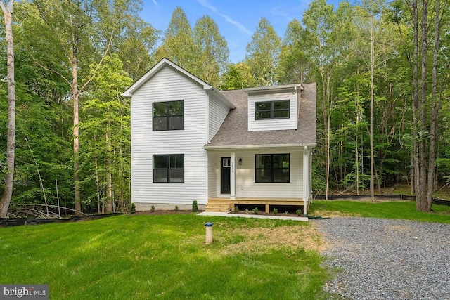 5831 Stubbs Bridge Rd, Mineral, VA 23117 - view of front of home with a front lawn, roof with shingles, and covered porch