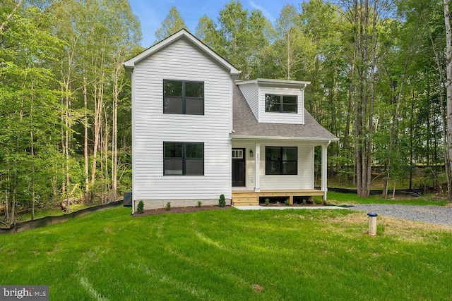 5831 Stubbs Bridge Rd, Mineral, VA 23117 - modern farmhouse style home with covered porch, a front yard, and roof with shingles