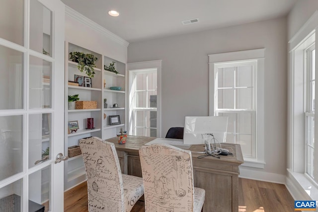 office space with visible vents, wood finished floors, and recessed lighting