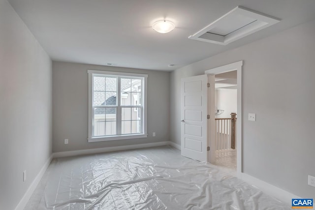 unfurnished bedroom featuring baseboards, marble finish floor, and visible vents