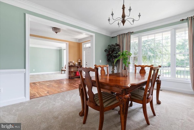519 Cardinal Ln, Warrenton, VA 20186 - dining room with carpet, plenty of natural light, a chandelier, and crown molding