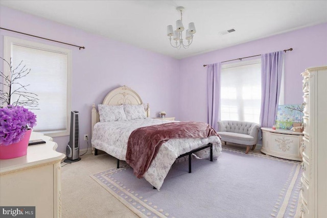 519 Cardinal Ln, Warrenton, VA 20186 - bedroom with a chandelier and light colored carpet