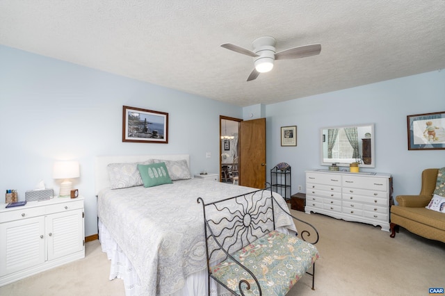609 Jefferson Dr, Palmyra, VA 22963 - carpeted bedroom featuring a textured ceiling and ceiling fan