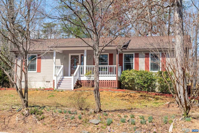 609 Jefferson Dr, Palmyra, VA 22963 - single story home with covered porch, a shingled roof, and crawl space