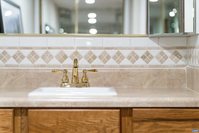 609 Jefferson Dr, Palmyra, VA 22963 - interior details with decorative backsplash and a sink
