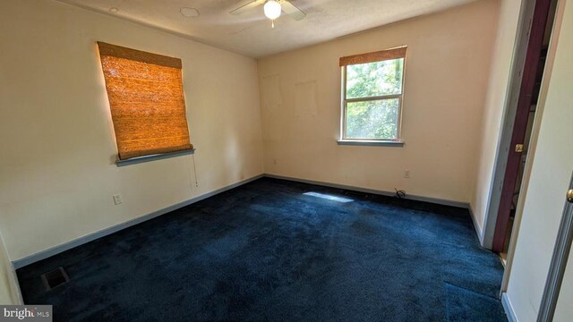 400 Laurel Dr, Madison, VA 22727 - unfurnished room with a ceiling fan and dark carpet
