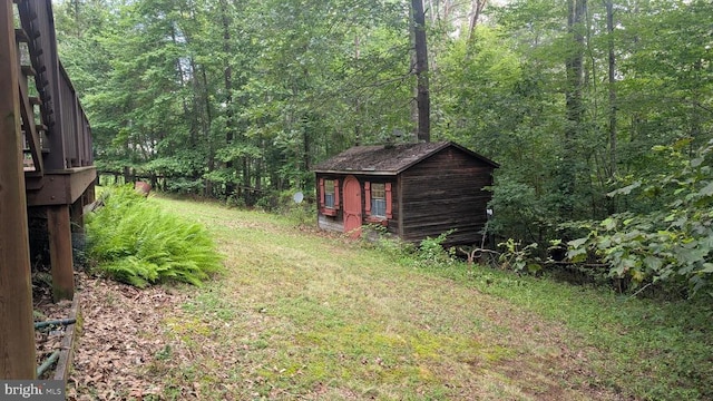 400 Laurel Dr, Madison, VA 22727 - view of grassy yard with a storage shed and a wooded view