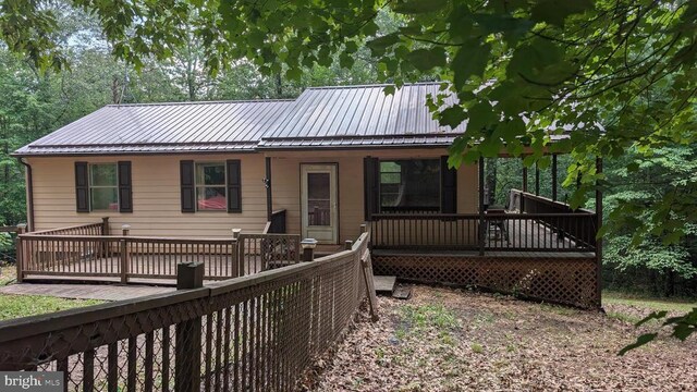 400 Laurel Dr, Madison, VA 22727 - back of property with a metal roof and a deck