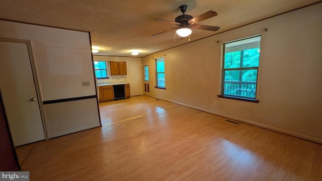 400 Laurel Dr, Madison, VA 22727 - unfurnished living room with light wood finished floors and ceiling fan