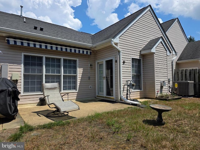 11206 Lynchburg Dr, Fredericksburg, VA 22407 - back of property featuring a patio area and roof with shingles
