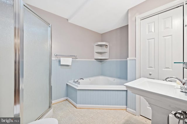 13001 Country View Ln, Amissville, VA 20106 - bathroom featuring wainscoting, a bath, a stall shower, and tile patterned floors