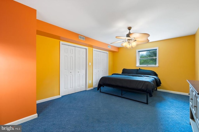 13001 Country View Ln, Amissville, VA 20106 - carpeted bedroom featuring two closets and ceiling fan