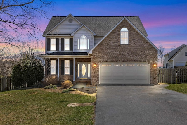 30 Sir Robin Rd, Waynesboro, VA 22980 - traditional home with driveway, an attached garage, brick siding, and roof with shingles