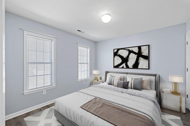 30 Sir Robin Rd, Waynesboro, VA 22980 - bedroom with dark wood-type flooring and baseboards