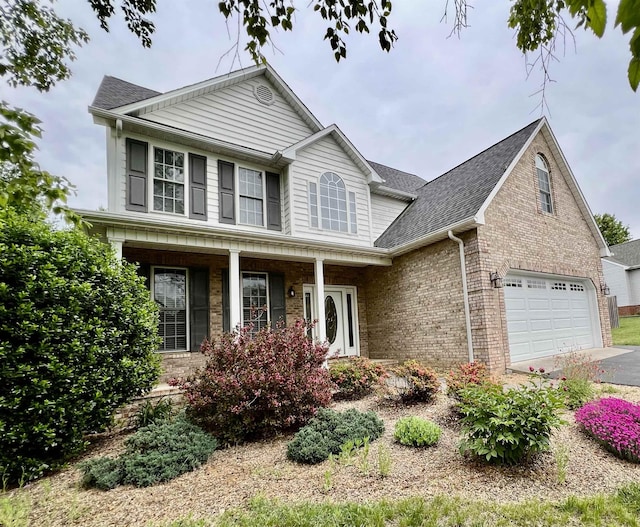 30 Sir Robin Rd, Waynesboro, VA 22980 - traditional-style house with driveway, brick siding, a shingled roof, and a porch