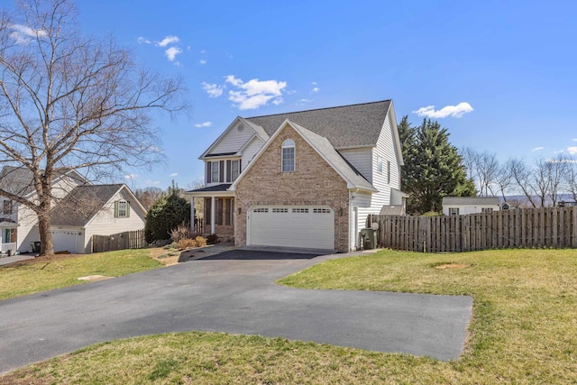 30 Sir Robin Rd, Waynesboro, VA 22980 - traditional home with asphalt driveway, brick siding, and a garage