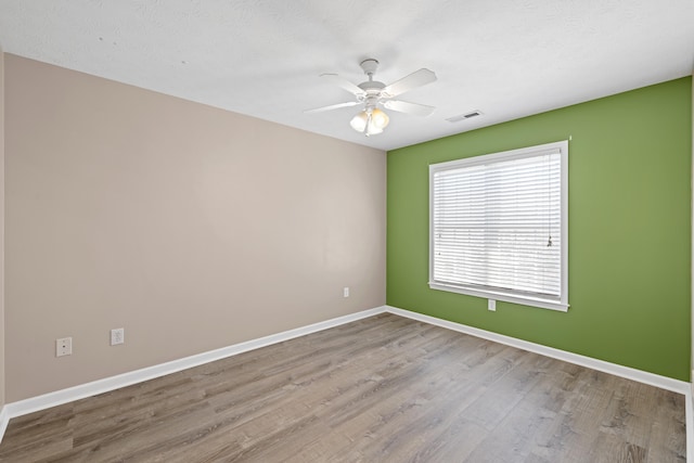 30 Sir Robin Rd, Waynesboro, VA 22980 - spare room featuring wood finished floors, baseboards, and ceiling fan