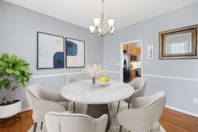 30 Sir Robin Rd, Waynesboro, VA 22980 - dining room featuring a chandelier, light wood-style floors, and baseboards
