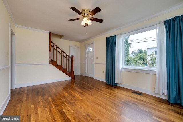 220 Mechanic St, Luray, VA 22835 - entrance foyer featuring ornamental molding, stairway, ceiling fan, wood finished floors, and baseboards