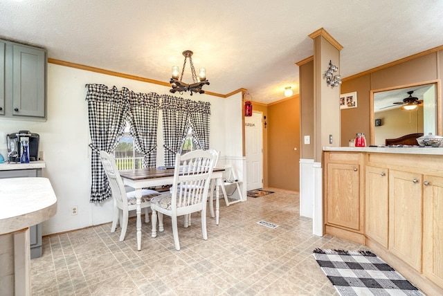 3930 Williams Ln, Elkton, VA 22827 - dining space with a chandelier, ornamental molding, a ceiling fan, and a textured ceiling