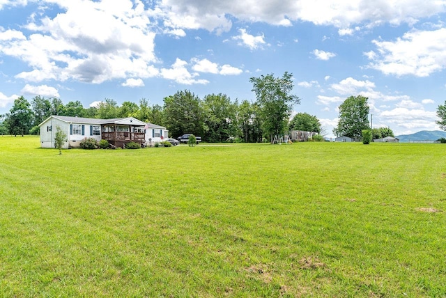 3930 Williams Ln, Elkton, VA 22827 - view of green lawn featuring a deck