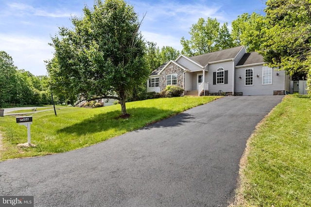 7306 Pullen Dr, Fredericksburg, VA 22407 - ranch-style house with asphalt driveway, a front lawn, and roof with shingles