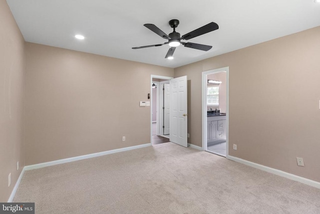 7306 Pullen Dr, Fredericksburg, VA 22407 - unfurnished bedroom with light carpet, baseboards, ensuite bathroom, recessed lighting, and ceiling fan